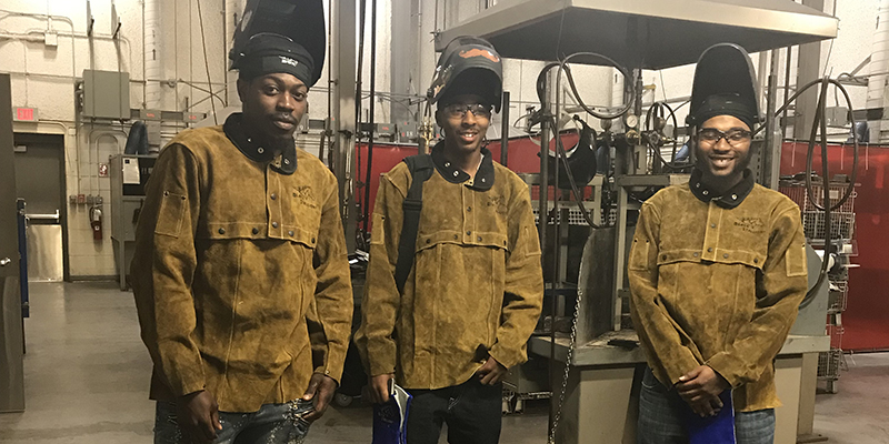 Bridge Plus program students in the welding lab on the Portsmouth Campus.