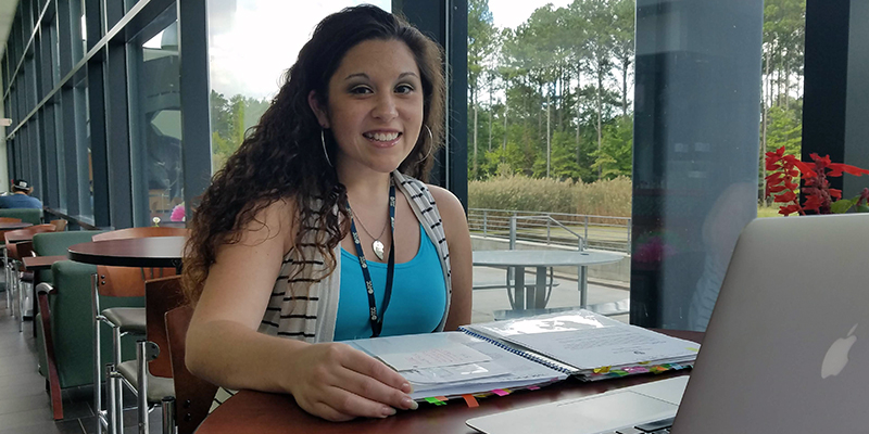 oni Anderson studying in the Chesapeake Campus Student Center.