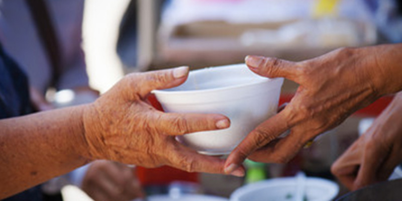 Hands holding a bowl